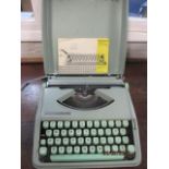 A retro Hermes Baby Rocket typewriter
