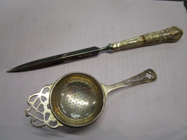 A pair of silver wine coasters, A/F, a tea strainer and a letter knife, A/F, Birmingham - Image 2 of 2