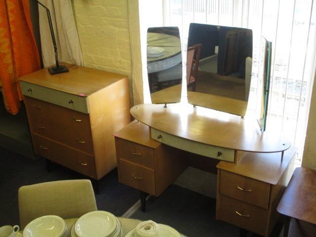 A mid 20th century Limelight chest of drawers together with a matching dressing table and a G-plan