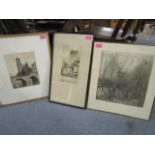 A group of three framed and glazed etchings to include a signed Russian etching of buildings in a