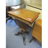A Victorian walnut serving table having fitted compartments and three splayed legs, 28" x 17"h