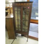 An Art Nouveau inlaid mahogany corner cabinet on square tapering legs with spade feet, 64 2/8" x 26"