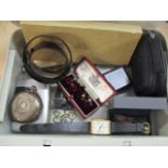 A selection of miscellaneous items to include an engine turned pocket watch, hat pins, a silver