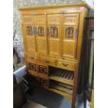 A 20th century Chinese pine chicken coop cabinet, 69 1/2" h x 41 1/4"w