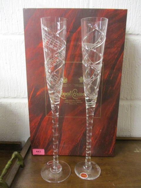 A pair of boxed Royal Brierley Millennium limited edition Champagne flutes, 16"h