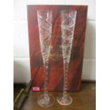 A pair of boxed Royal Brierley Millennium limited edition Champagne flutes, 16"h