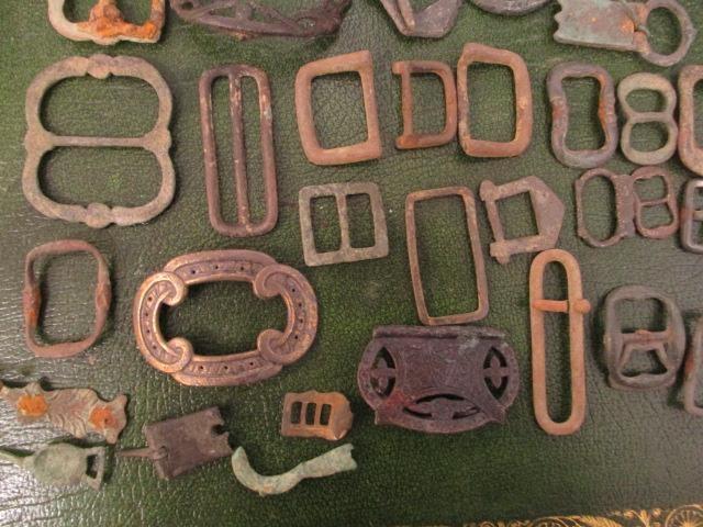 A collection of metal detector finds, mainly buckles and artefacts to include early bronze, brass, - Image 2 of 3