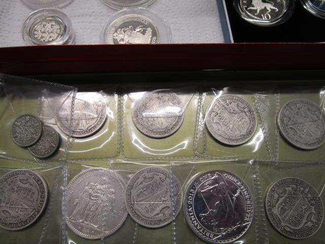 A selection of British and Commonwealth silver coins to include a one and two dollar Bahamas - Image 3 of 4