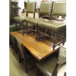 An mid 20th century oak refectory extending draw leaf dining table, 30"h x 57" w, together with