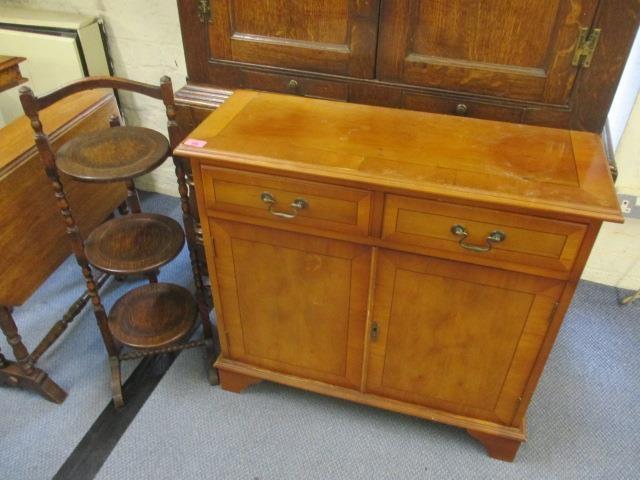 A reproduction yew wood side cabinet, together with a 1930s cake stand