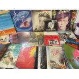 A collection of late 20th century LPs to include David Bowie, Bob Dylan, Supertramp and Elvis