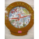 An RAFA Teignmouth Red Arrows pictorial plate, mounted in an oak frame inscribed in gilt letters