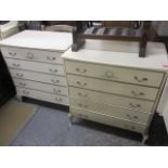 A pair of French style cream painted chests of five long drawers, 33" h, 30 3/4"w