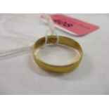 A 22ct gold wedding band, 1.6g