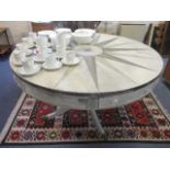 A reproduction Regency style painted drum table