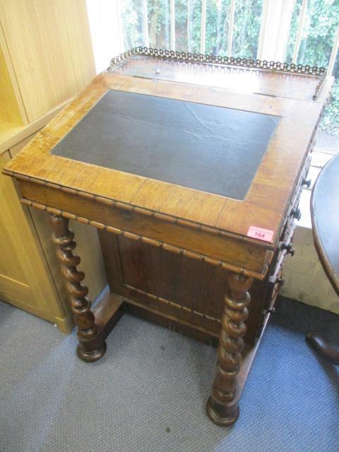 A Victorian rosewood Davenport having four side drawers and two barley twist supports, 34"h x 22 1/