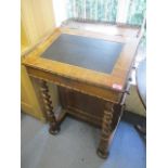 A Victorian rosewood Davenport having four side drawers and two barley twist supports, 34"h x 22 1/