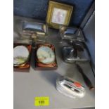 Three silver plated ashtrays with wooden handles, a lighter and other items