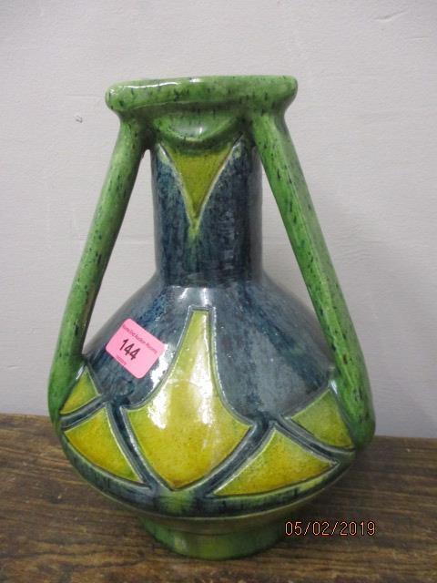 A studio pottery vase of bulbous form with geometric motifs