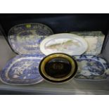 A group of pottery meat plates to include an Arabia plate and a Victorian blue and white meat plate