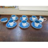 A Susie Cooper part coffee set, decorated with blue dots to the exterior, with blue glazed