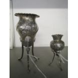 William Comyns & Sons Ltd - a Victorian silver vase on tripod legs with hoof feet and ram marks,