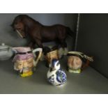 A Beswick model of a horse, a small Royal Doulton character jug, and two others by different makers,