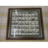 A framed and glazed set of forty-one WA and AC Churchman Holidays in Britain series of cigarette