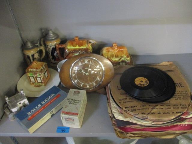 A mixed lot to include a mid 20th century clock, razors, records, china and other items