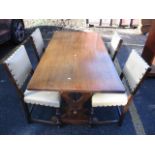 An oak refectory dining table 30 3/4"h x 60"w, and a set of four leather button back chairs