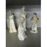 A group of four porcelain figurines to include a Lladro model of a kneeling girl
