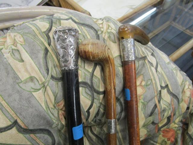 Three Victorian and later walking sticks, each with a silver ferrel or handle - Image 3 of 4