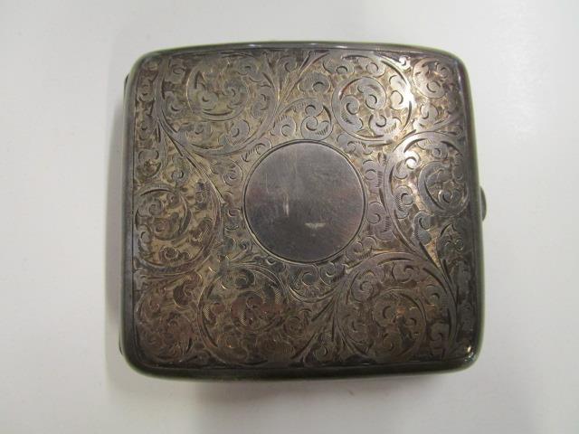 An Edwardian silver cigarette case with floral scrolled decoration, Birmingham 1919, marks for - Image 3 of 10