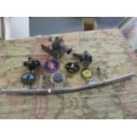 A selection of vintage car items to include badges, two Lucas lamps and a Cowey horn