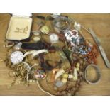 A mixed lot to include a 9ct gold locket, a pocket watch, mixed wristwatches and costume jewellery