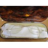 A cased display pair of large Giorgio Armani spectacle glasses