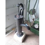A Victorian cast iron black painted garden water pump