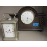 A 1930s oak mantle clock and a carriage clock