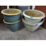 Four glazed garden pots, largest 11"h