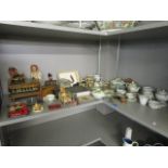 A mixed lot of dolls house furniture, dolls, and childrens' porcelain tea sets to include The Pit