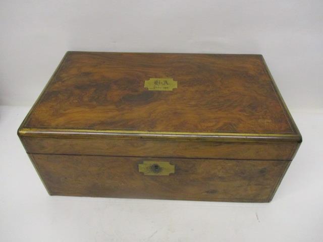 A Victorian figured walnut, military style writing slope with brass edges, enclosing a pair of - Image 2 of 6