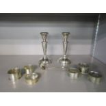 A pair of Elizabeth II silver filled candlesticks, Birmingham 1972/73, mixed silver napkin rings,