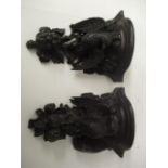 A pair of late 19th century continental carved, lime wood brackets with birds perched on a branch,