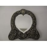 A Victorian silver mirror by William Comyns & Sons, London 1894 with embossed, pierced, scrolled