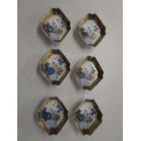 A set of six 19th century Japanese old Imari dishes, diamond-shaped with incurved truncated corners,