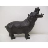 An early 20th century Japanese cast bronze model of a hippopotamus with its jaws wide open, signed