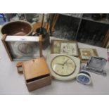 A mixed lot to include wall tiles, a coffee grinder, various clocks to include a travel clock and