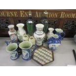 A mixed lot to include a pair of mottled green table lamps, Chinese vases, a Franklin Mint vase