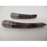 A pair of 19th century Chinese silver and tortoiseshell fingernail guards with embossed and chased