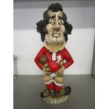 A John Hughes Grogg Potter figurine of Gareth Edwards wearing the number 9 rugby shirt of Wales,